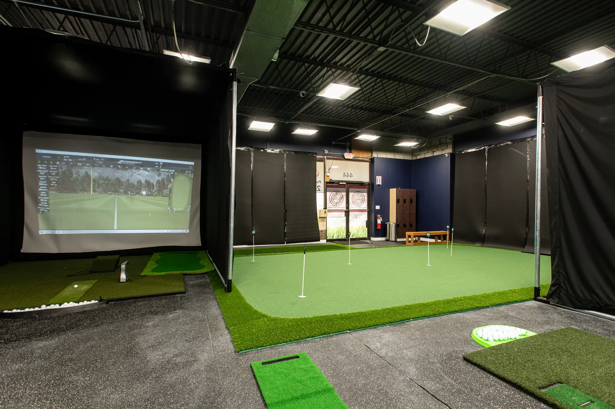 Precision Golf Training facility angle view — indoor golf simulator bays in Libertyville IL