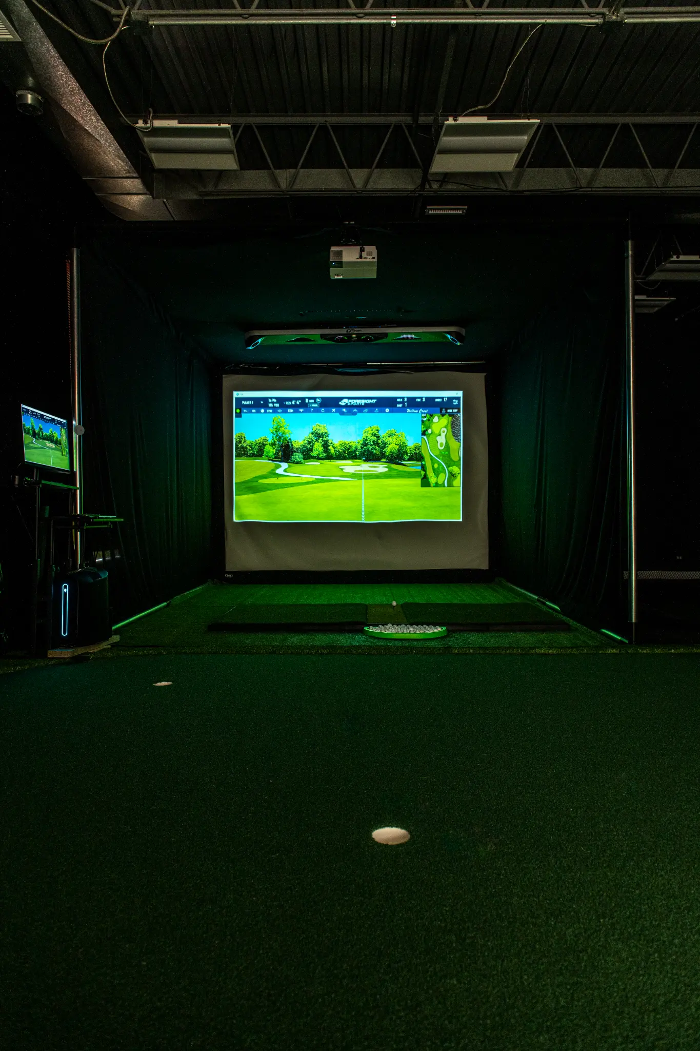 Foresight GCQuad simulator screen showing ball flight data at Precision Golf Training Libertyville IL